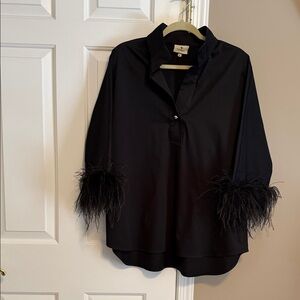 Tuckernuck black tunic top with feather cuffs